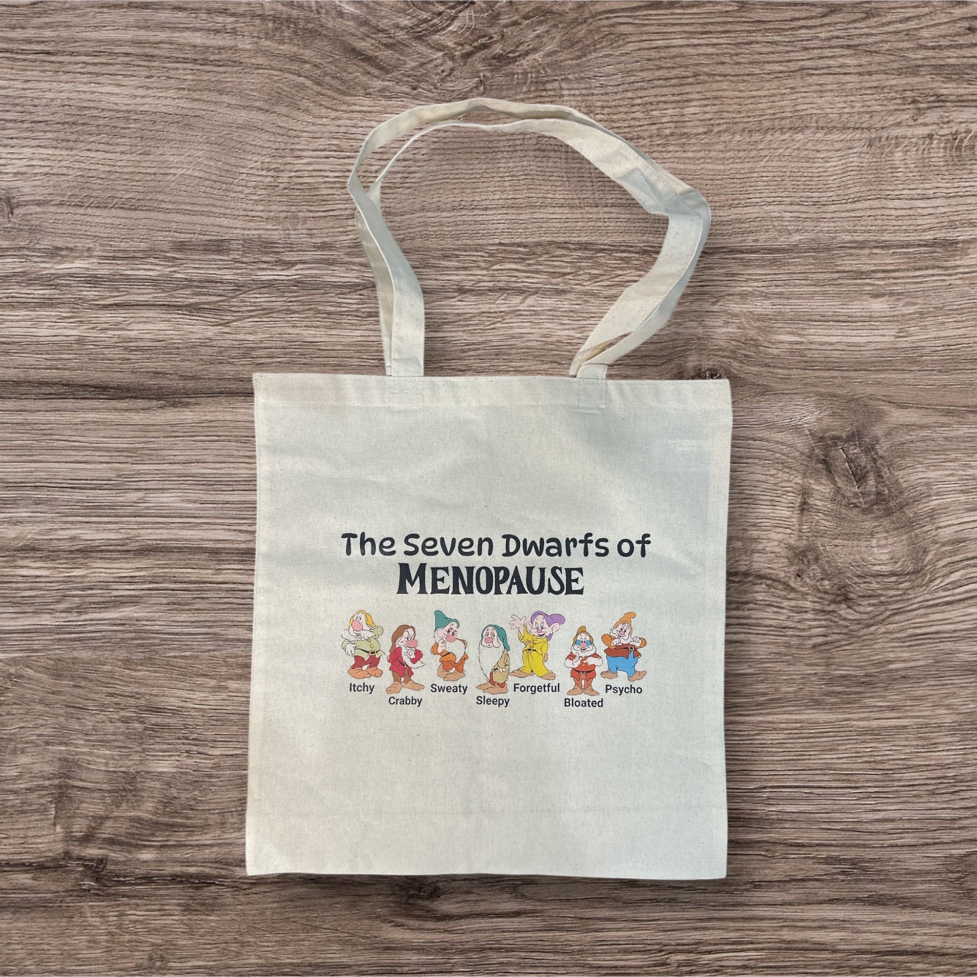 “The Seven Dwarfs of Menopause” Cotton Tote Bag
